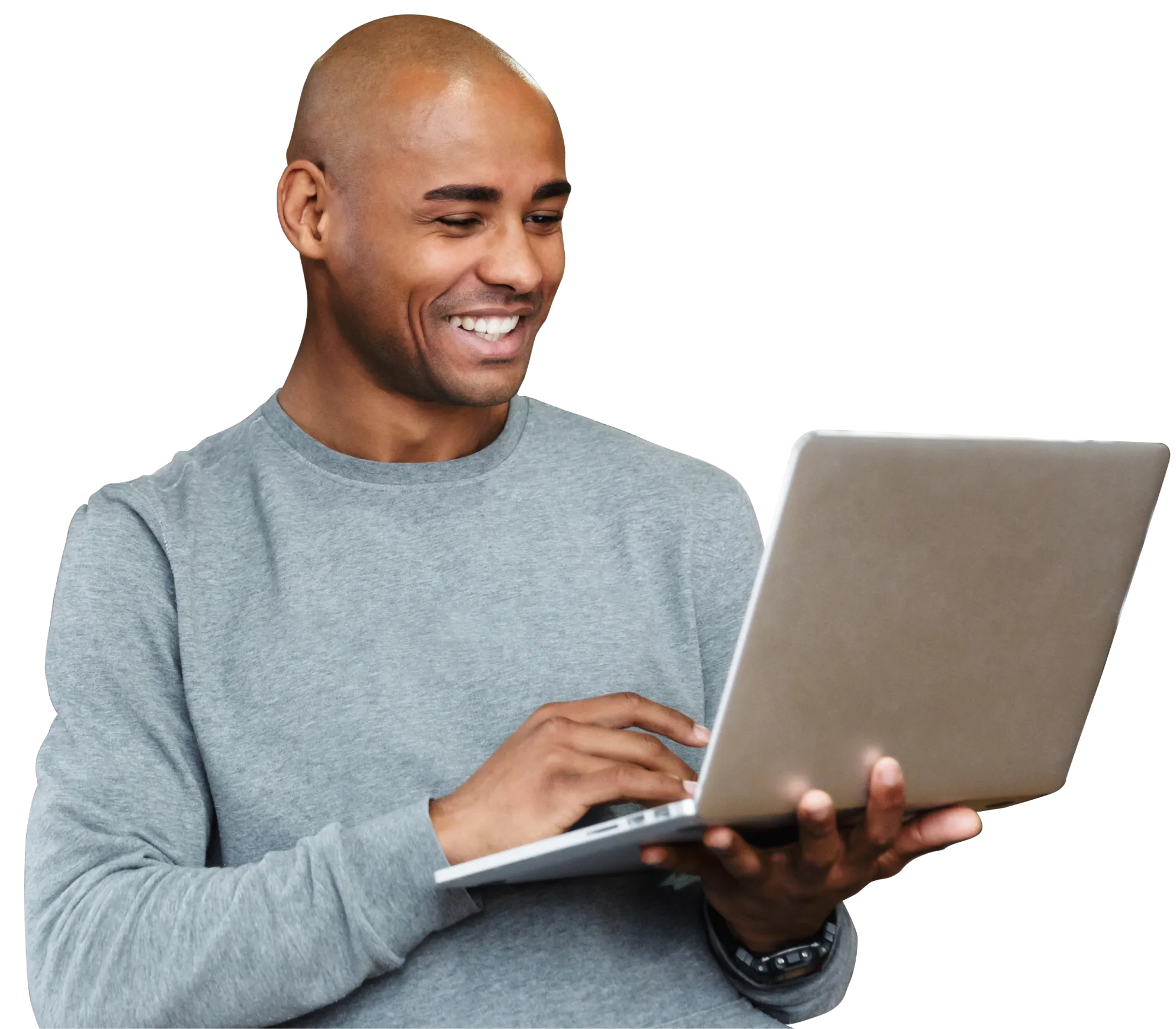 Happy bald man using laptop