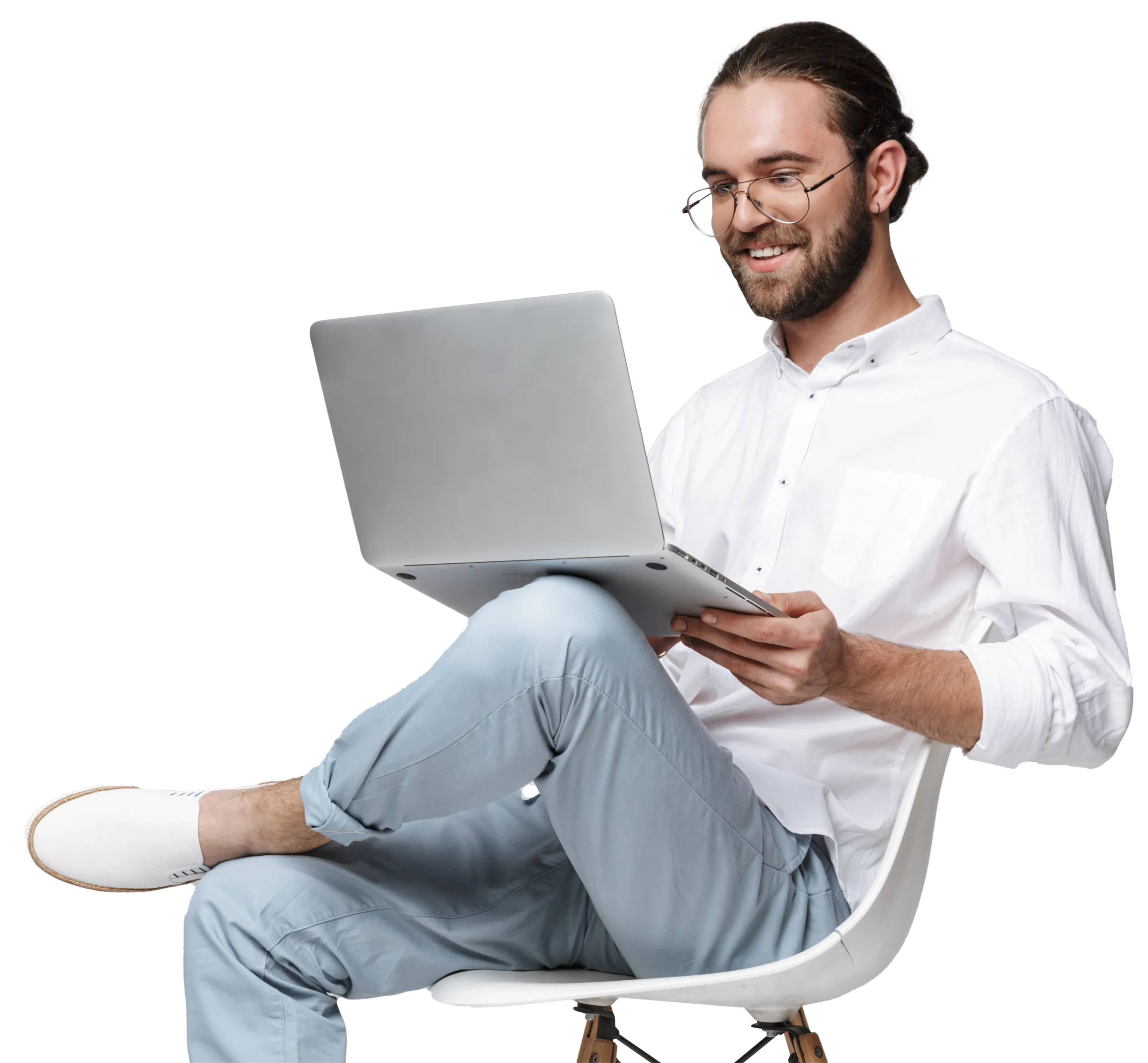 Man sitting on chair using laptop