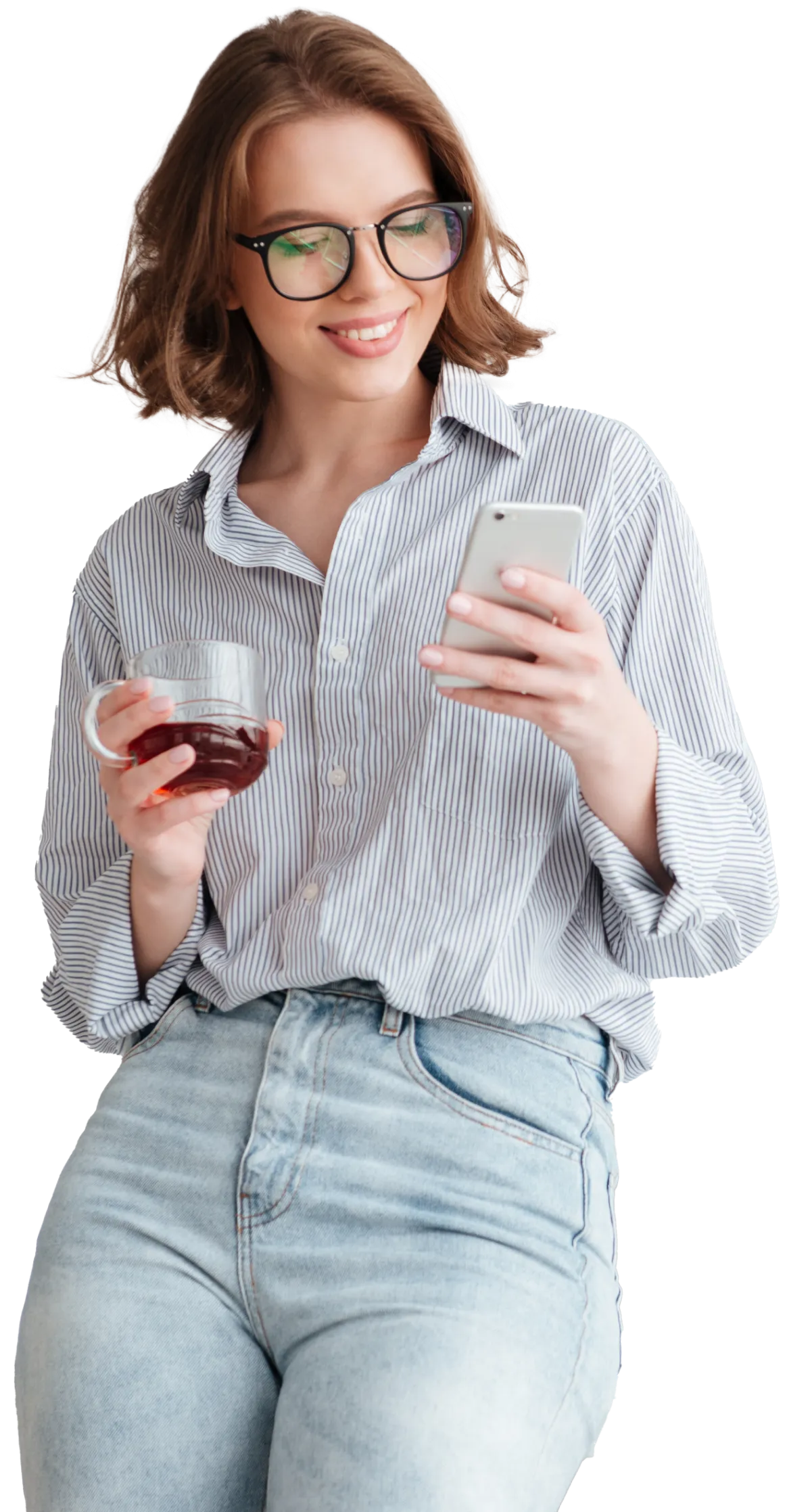 Woman drinking juice looking at phone